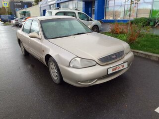2001 Kia Clarus II, бежевый, 185000 рублей, вид 1