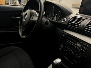 2010 BMW 1 серии 116i I (E81/E82/E87/E88) Рестайлинг, чёрный, 850000 рублей, вид 2