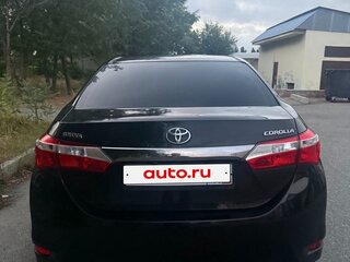 2014 Toyota Corolla XI (E160, E170, E180), чёрный, 1250000 рублей, вид 3