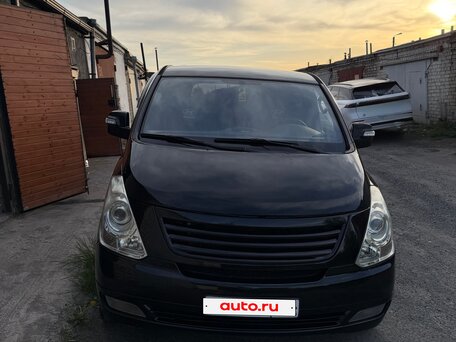 2010 Hyundai Grand Starex I, чёрный, вид 4