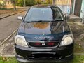 2001 Toyota Corolla Fielder IX (E120, E130), чёрный, 680000 рублей - вид 1