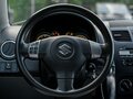 2012 Suzuki SX4 I (Classic) Рестайлинг, чёрный, 810000 рублей - вид 5