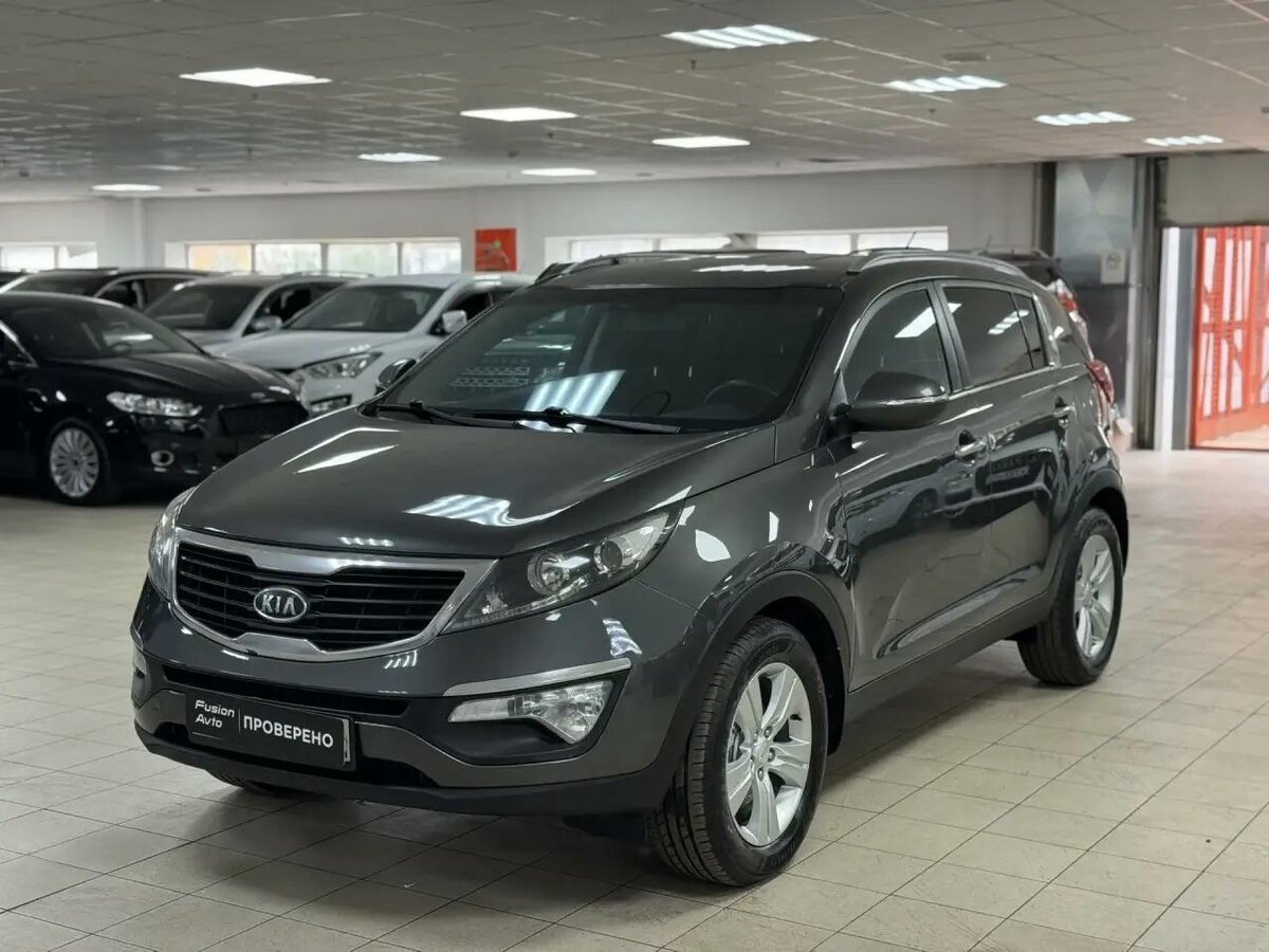 Открыть фотографии: Kia Sportage III