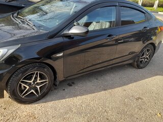 2011 Hyundai Solaris I, чёрный, 630000 рублей, вид 3