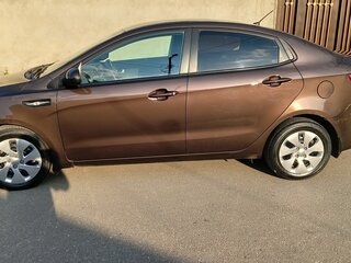 2016 Kia Rio III Рестайлинг, коричневый, 700000 рублей, вид 5