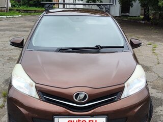 2011 Toyota Vitz III (XP130), коричневый, 750000 рублей, вид 2