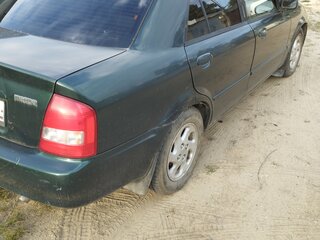 1999 Mazda Protege III (BJ), зелёный, 180000 рублей, вид 3