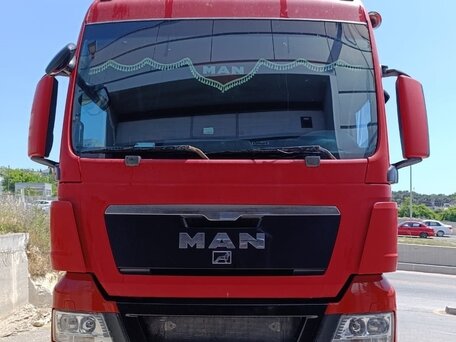 2011 MAN TGX, красный, 3500000 рублей, вид 1