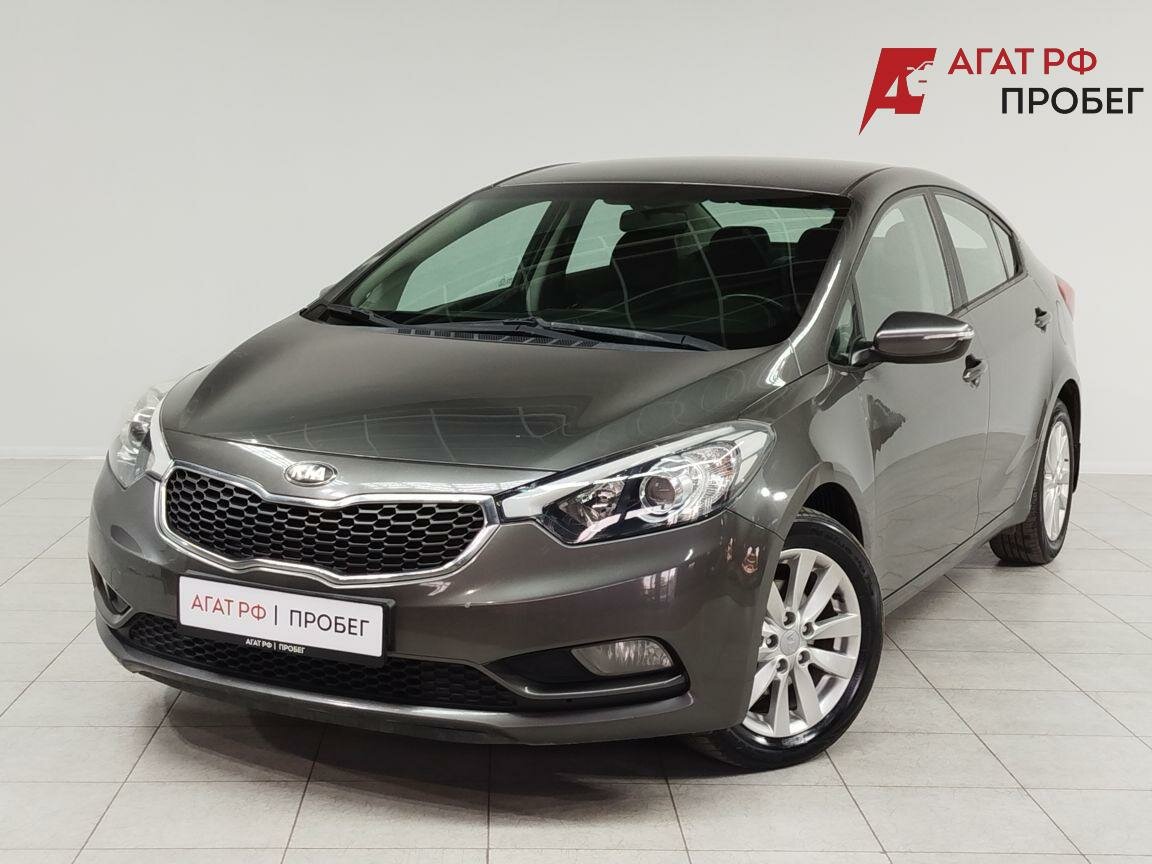 Открыть фотографии: Kia Cerato III