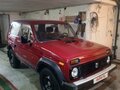 1997 Lada (ВАЗ) 2121 (4x4) I Рестайлинг, пурпурный, 320000 рублей - вид 1