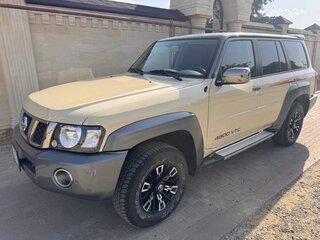 2023 Nissan Patrol V (Y61) Рестайлинг, бежевый, 8200000 рублей, вид 4