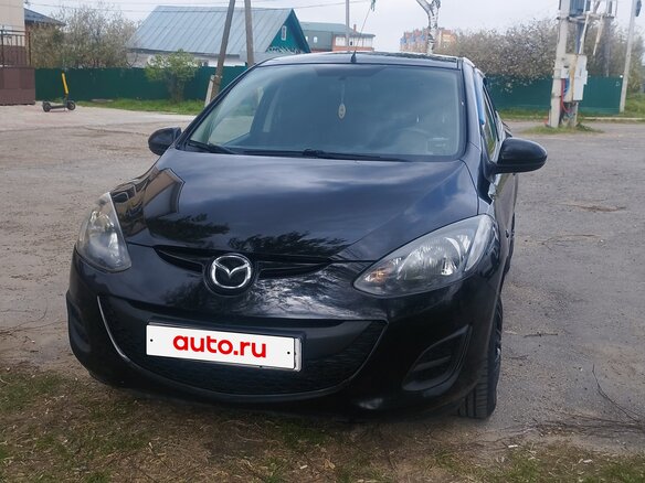 2012 Mazda 2 II Рестайлинг (DE2), чёрный, 820000 рублей - вид 1