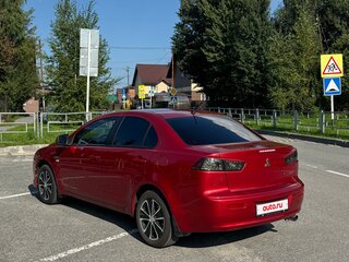 2008 Mitsubishi Lancer X, красный, 810000 рублей, вид 4