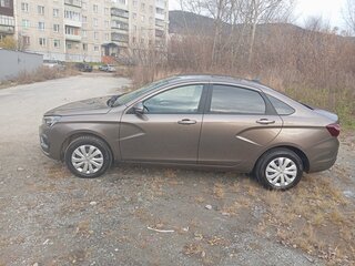2024 Lada (ВАЗ) Vesta I Рестайлинг (NG), коричневый, 1350000 рублей, вид 4