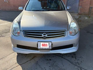 2001 Nissan Skyline XI (V35), серебристый, 600000 рублей, вид 1