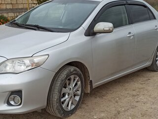 2012 Toyota Corolla X (E140, E150) Рестайлинг, серебристый, 1100000 рублей, вид 2