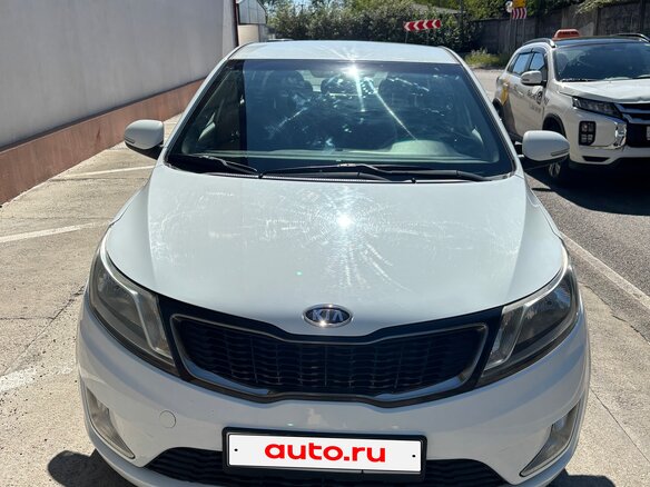 2011 Kia Rio 4-speed III, белый, 1050000 рублей - вид 1