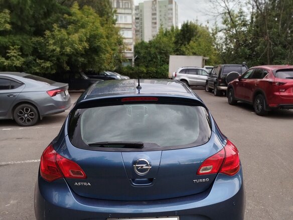 2013 Opel Astra J Рестайлинг, синий - вид 1