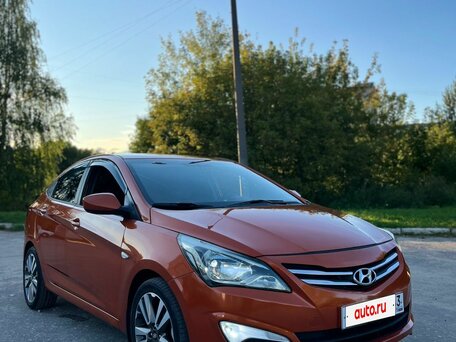2015 Hyundai Solaris I Рестайлинг, оранжевый, 750000 рублей, вид 3