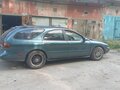1999 Ford Taurus IV, зелёный, 230000 рублей