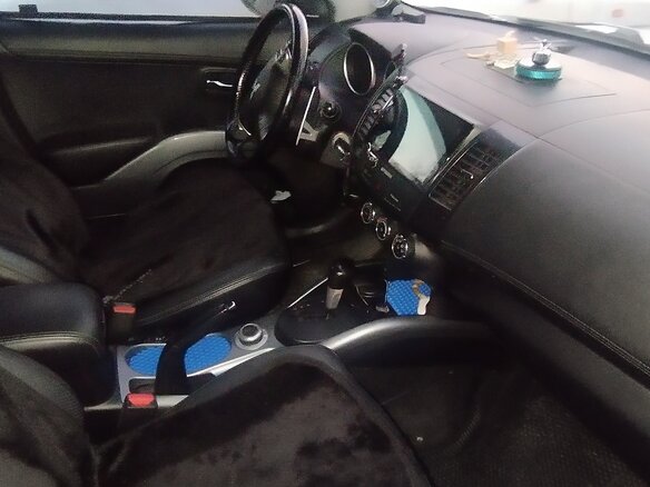 2010 Mitsubishi Outlander II Рестайлинг, серебристый, 1300000 рублей - вид 3