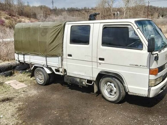 1992 Isuzu Elf (N-series), белый, 750000 рублей - вид 1