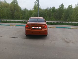 2014 Hyundai Solaris I Рестайлинг, оранжевый, 930000 рублей, вид 5