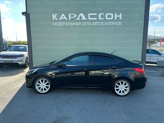 2013 Hyundai Solaris I, чёрный, 676000 рублей, вид 3
