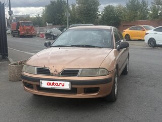 2000 Mitsubishi Carisma I Рестайлинг, золотистый, 175000 рублей, вид 2