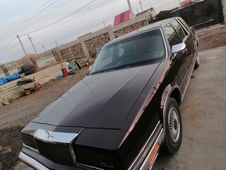 1990 Chrysler New Yorker Fifth Avenue XIII, пурпурный, 5550000 рублей, вид 1