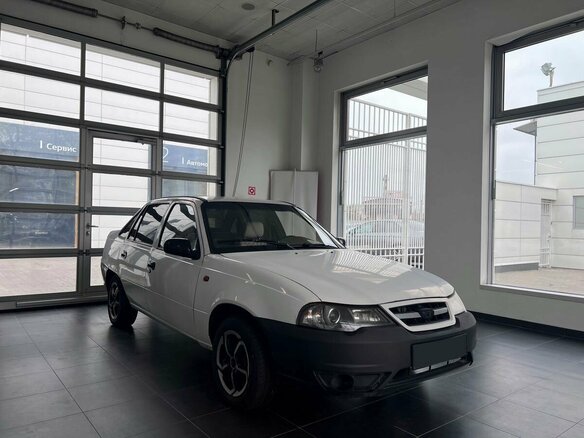 2014 Daewoo Nexia I Рестайлинг, белый, 200000 рублей