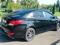 2013 Hyundai Solaris I, чёрный, 1030000 рублей - вид 4