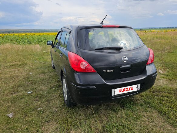 2010 Nissan Tiida I Рестайлинг, чёрный, 550000 рублей - вид 1