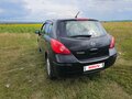 2010 Nissan Tiida I Рестайлинг, чёрный, 550000 рублей - вид 1