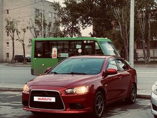 2011 Mitsubishi Lancer X Рестайлинг, красный, 659000 рублей, вид 1