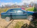 1999 Mitsubishi Carisma I Рестайлинг, зелёный, 258000 рублей - вид 4