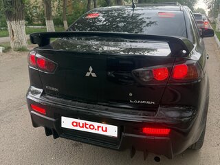 2010 Mitsubishi Lancer X, чёрный, 899000 рублей, вид 3