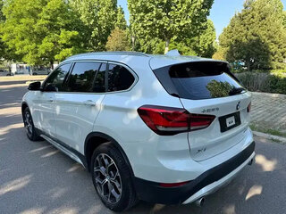 2022 BMW X1 Long 20Li sDrive II (F48) Рестайлинг, белый, 1990000 рублей, вид 4