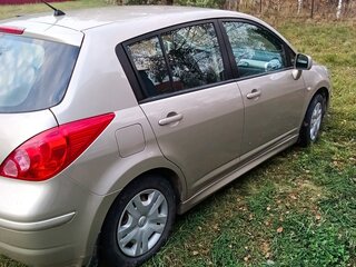 2011 Nissan Tiida I Рестайлинг, бежевый, 880000 рублей, вид 4