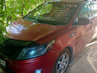 2013 Kia Rio 5-speed III, красный, 700000 рублей, вид 3
