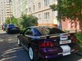 1996 Ford Mustang IV, фиолетовый - вид 2