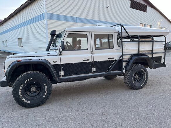 2004 Land Rover Defender 130 I, белый - вид 3
