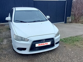 2011 Mitsubishi Lancer X Рестайлинг, белый, 600000 рублей, вид 1