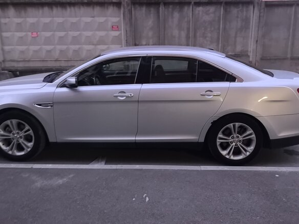 2016 Ford Taurus VI Рестайлинг, серый, 1100000 рублей - вид 7