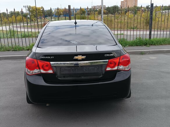 2011 Chevrolet Cruze I, чёрный, 640000 рублей - вид 4