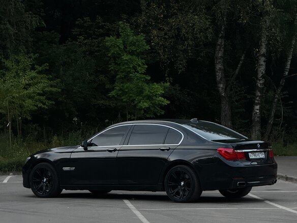 2011 BMW 7 серии 750i xDrive V (F01/F02/F04), чёрный - вид 5