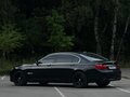 2011 BMW 7 серии 750i xDrive V (F01/F02/F04), чёрный - вид 5