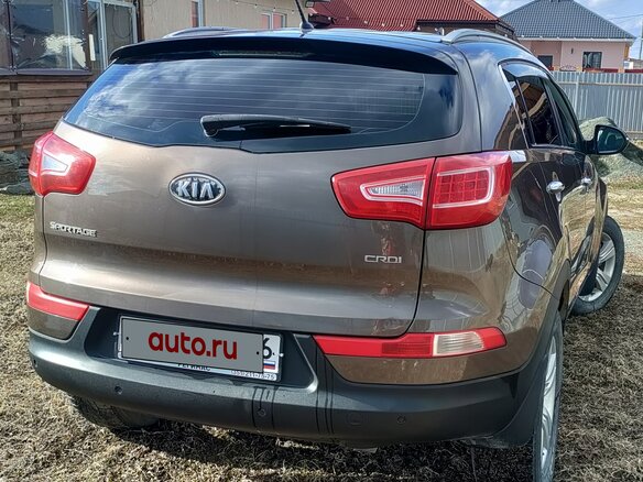 2011 Kia Sportage III, коричневый, 830000 рублей - вид 3