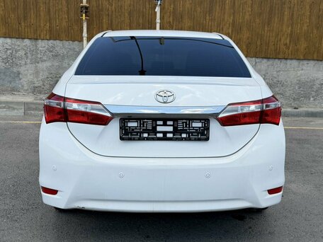 2014 Toyota Corolla XI (E160, E170, E180), белый, 1100000 рублей, вид 5