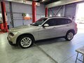 2013 BMW X1 18i I (E84) Рестайлинг, бежевый, 1470000 рублей - вид 8